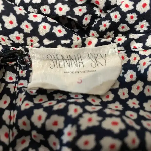 Sienna Sky Navy Floral Peplum Blouse