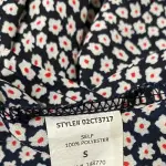 Sienna Sky Navy Floral Peplum Blouse